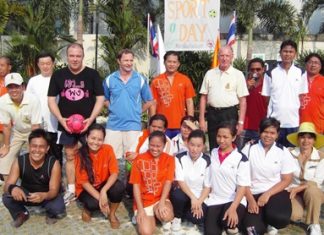 The Thai Garden Resort management players prepare to take on the female staff team at football.